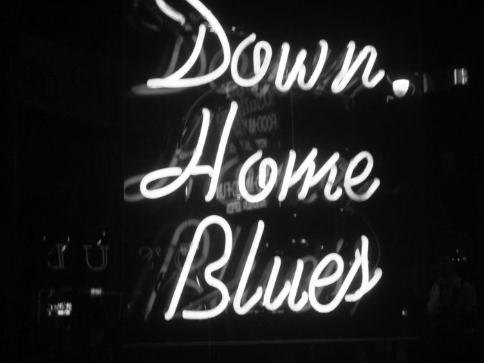 A Neon sign that reads Down Home Blues